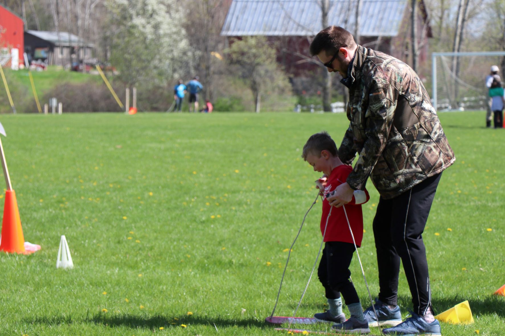 Dad and son figuring out a buddy walk